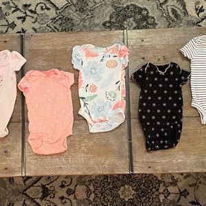 Carter’s newborn girls onesies (8 pieces)